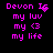 Pixelated text in bright pink on black background with animated heart and dot effects.