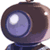 Pixelated static icon of a dark brown helmet with a large purple-tinted circular visor showing white highlights, set against a transparent background.