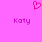 Pixelated pink heart above two instances of the name 'Katy' on a solid pink background.