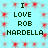 Static image with light blue background and red starburst patterns, displaying repeated text in dark green pixelated font.