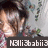 A pixelated image of a person with dark hair wearing a red and white checkered shirt, partially obscured by text overlay.