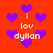 Red background with purple heart shapes and white text reading "i lov dylan" in pixelated font.