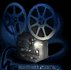 Two side-by-side frames of a film projector with blue reels and silver body, showing slight differences in light reflection on the central lens.