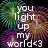 Pixelated text reads 'you light up my world <3' over a multicolored pixelated background with green, purple, and brown tones.