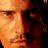 A static image with red and black sections containing text about Orlando Bloom as a pirate, featuring partial face crops of a man.
