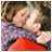 Animated sequence showing a couple embracing, transitioning from full-color to pink gradient backgrounds with text elements appearing sequentially.