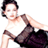 Pixelated static image of a person in motion wearing dark shorts and a white sleeveless top against a plain background.