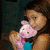 A four- shows a girl with dark hair holding a pink pig plush, then resting her head on a blue blanket, forming a heart shape with hands around 'BFF!' text