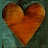A 3x2 contact sheet of a pixelated animated icon featuring an orange heart shape against a teal background with visible text appearing across frames.
