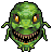 Pixelated green monster head with glowing yellow eyes, sharp brown teeth, and multiple tentacles against a gray background.