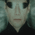 Pixelated face with light skin tone, dark eyes, and closed mouth in two of three identical frames