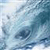 Pixelated static image of a blue-toned abstract wave or water scene with no visible text, characters, or distinct objects.