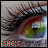 A pixelated eye with long lashes and a green-yellow iris, overlaid with colored text fragments in different frames.