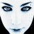Pixelated close-up of a face with dark eyes, arched eyebrows, and light skin against black background.