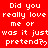 Red background with repeated white pixelated text reading "Did you really love me or was it just pretend?" in a pattern, some instances ending with heart symbols