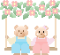 Two teddy bears sit on a swing beneath a floral arch, with the left bear in blue overalls and the right bear in pink overalls and a pink flower on her head.