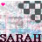 Pixelated image with pink heart symbol, checkered pattern, and stylized text at bottom.