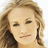 A pixelated image of a woman with light brown hair on the left, next to bright pink background text reading "Carrie Underwood" and "not as pretty as ME! So Pretty but.."