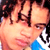 Static pixelated image of two people in close proximity with visible facial features and partial clothing details.