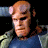 A pixelated buddy icon featuring a character with light brown hair and a blue shirt on the left, next to bold text reading "HELL BOY 4.2.04" on a pinkish-red background.