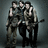 Three pixelated figures in dark vests and light shirts stand closely together against a gray background, with one figure holding an object resembling a microphone.