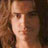 Static 48x48 pixel icon showing a heavily pixelated close-up of a person's face with brown hair and light skin tones, rendered in warm orange-brown color palette.