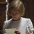 A 48x48 pixel buddy icon featuring a person with short blonde hair in a white top holding an object, paired with the text "BRIOHY" on a beige background.