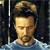 Pixelated static image of a person with dark hair styled upward, wearing a light blue shirt against a dark background with vertical light streaks.