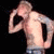 A four- shows a shirtless man with tattoos, another in black sleeveless shirt playing guitar, and a drummer; text 'MEST' appears below