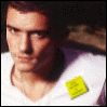 A person in a white shirt with a yellow square note on the chest, showing two states: one where the note is unframed and another where it's circled.