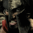 A pixelated image of a bearded man in armor with red text reading THIS IS SPARTA on white background.