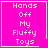 Four identical pink square display white pixelated text reading 'Hands Off My Fluffy Toys' with a single underline beneath 'Toys', each containing one of four distinct small symbols