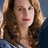 A woman with wavy light brown hair and red lips appears in three ; the bottom includes text reading 'c s m e !' over a blue background