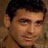Static 48x48 pixel icon showing a close-up of a person's face with dark hair and light skin tone, rendered in low-resolution pixel art style on brownish background.