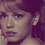 nine pixelated images showing a person with dark hair and bangs in various poses, each with the word 'SERENITY' below