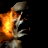 Pixelated figure with glowing orange and yellow fire-like effect on left side, dark background, partial visible limbs.