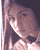 Two pixelated frames of a female character with long hair in different color schemes and poses, displayed side-by-side on a gray background.