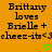 Orange background with black pixelated text reading "Brittany loves Brielle + cheese-its<3" and two green heart icons below.