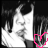 A grayscale anime-style character with dark hair and a white top, holding a pink heart outline that changes shape across frames.