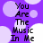 Purple background with light purple and white circles; black text reads "You Are The Music In Me" in four identical vertical sections.