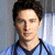 A pixelated contact sheet showing two frames of an animated icon featuring a person in medical scrubs on the left and green text reading "Original Icons .com" on the right against a dark background.