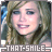 Pixelated static image of a smiling person with light brown hair and blue eyes, featuring text "THAT-SHILE" at the bottom on a gray background.