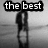 Black-and-white animation of two figures embracing on a beach, with changing text overlays across four