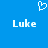 Blue background with white pixelated text 'Luke' on left and right, a heart symbol above center.