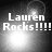 Black-and-white pixelated image with four identical displaying "Lauren Rocks!!!!!" text over a bright light burst background