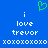 Blue background with white pixelated text reading 'i love trevor xoxoxoxoxo' and a green heart symbol above the left side of the text.