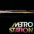 Animated sequence showing a black background with 'METRO STATION' text, transitioning to a white background with a colorful abstract shape and 'KONTRAKTORS' text.