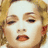 Pixelated image of a person with light brown hair and closed eyes, next to red text reading "MATERIAL GIRL" on yellow background.