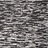 A static image shows a pixelated face with white makeup and dark eye makeup, next to a color bar test pattern and a textured gray background.