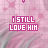 Pink pixelated text "I STILL LOVE HIM" on a pink background with green and white striped patterns, featuring small heart shapes